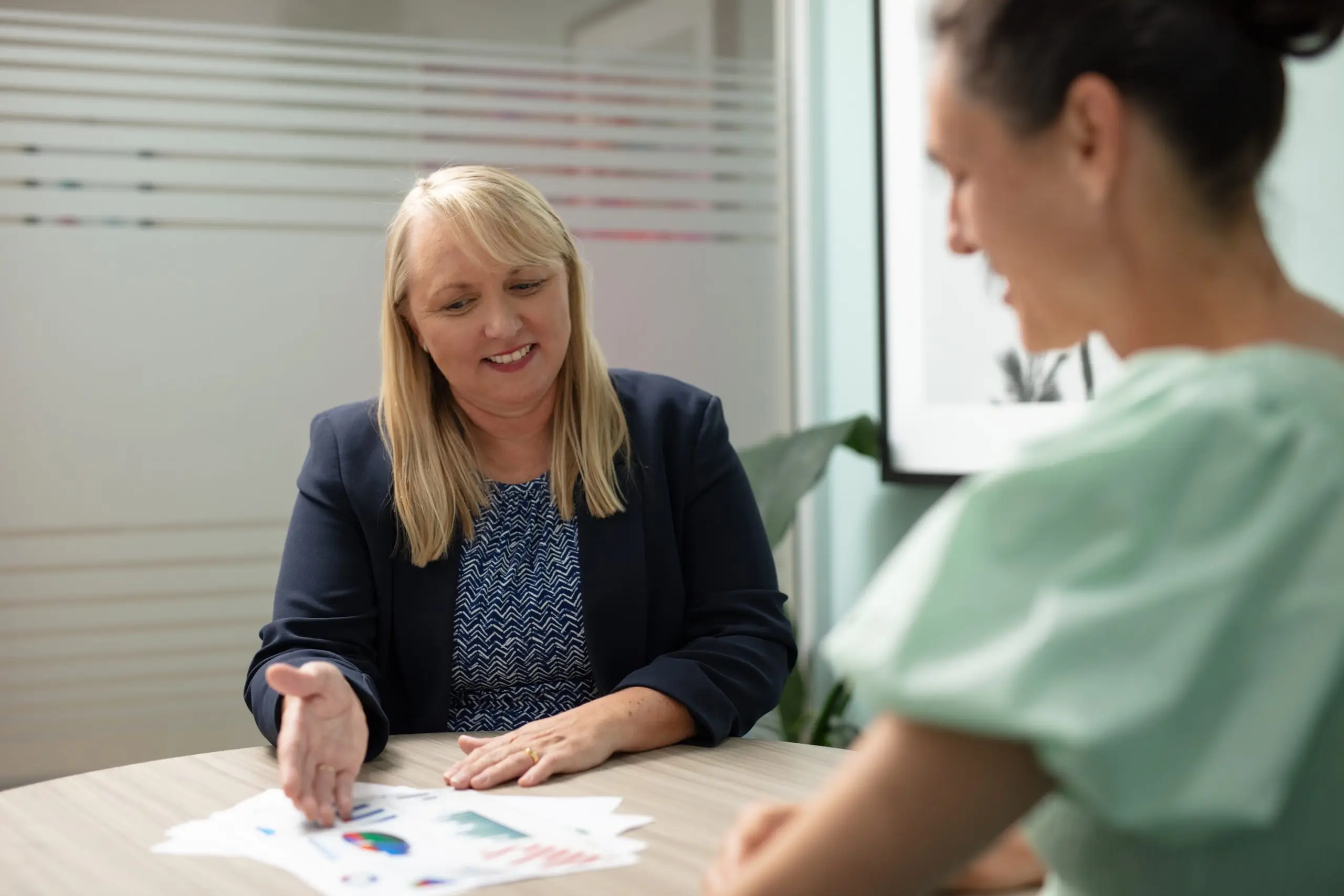 Expert bookkeeper talking with a client