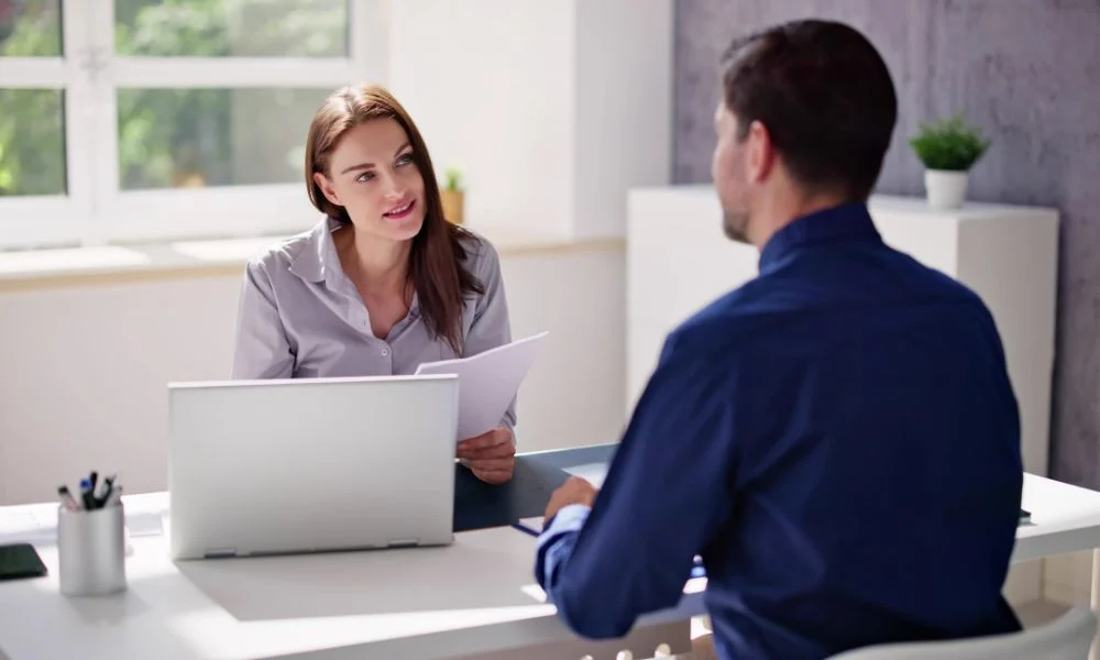 Trust accountant and client having discussion about tax