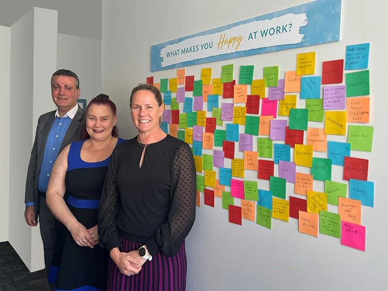 Team at the What Makes you happy Board